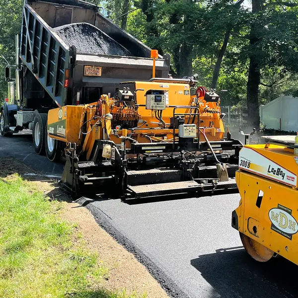 MDH Asphalt paving crew at work on Cape Cod with paving machine